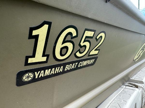 Slide: The Image of Close-up of 2023 G3 1652 VBW boat with Yamaha Boat Company logo. - 1