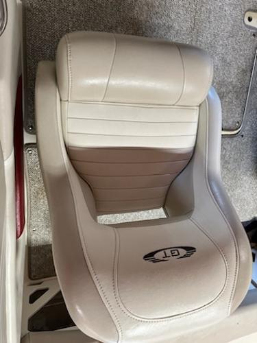 Slide: The Image of 2007 Glastron GT185 boat seat with white upholstery and GT logo. - 9