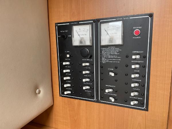 Slide: The Image of Electrical control panel of a 2009 Glastron GT 249 boat. - 16