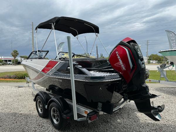 Slide: The Image of 2018 Glastron GTD 200 boat with Evinrude outboard motor on trailer. - 3