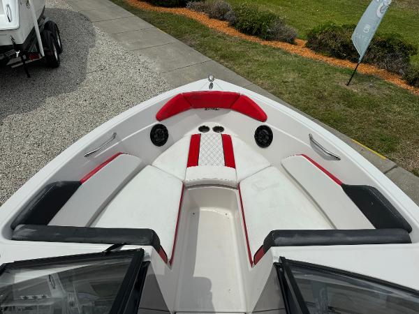 Slide: The Image of 2018 Glastron GTD 200 boat with red and white seating in the bow area. - 5