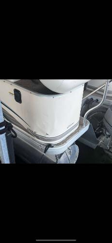 Slide: The Image of 2005 Godfrey AquaPatio 240 LE pontoon boat, partial view, docked. - 7