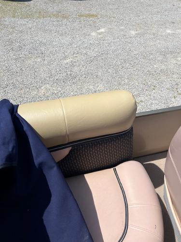 Slide: The Image of 2008 Godfrey SANPAN 2500 DC boat interior with beige and pink seating. - 11