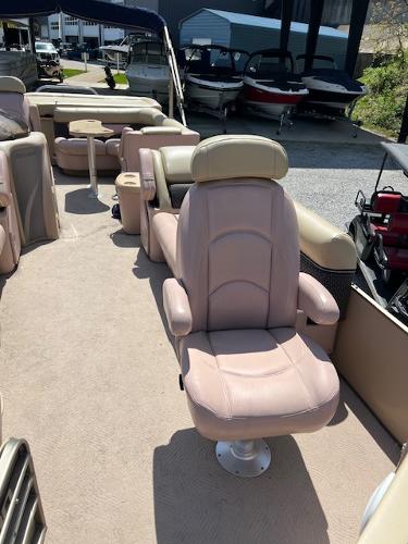Slide: The Image of 2008 Godfrey SANPAN 2500 DC boat interior with plush seating and spacious layout. - 14