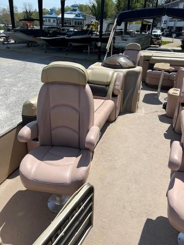 Slide: The Image of 2008 Godfrey SANPAN 2500 DC boat interior with beige seating and spacious layout. - 15