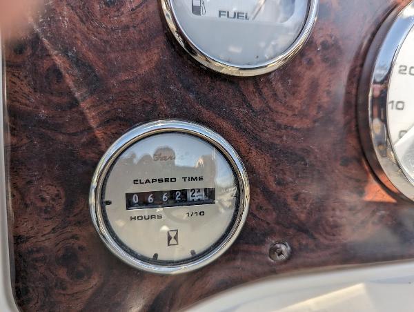 Slide: The Image of Close-up of 2006 Godfrey Sweetwater boat dashboard with elapsed time gauge. - 12