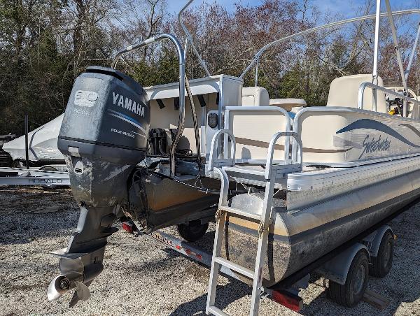 Slide: The Image of 2006 Godfrey Sweetwater pontoon boat with Yamaha motor on trailer. - 3