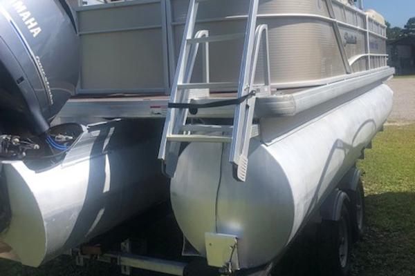 Slide: The Image of 2018 Godfrey Sweetwater 2286C pontoon boat with Yamaha engine, rear view. - 2