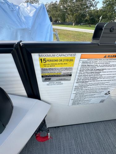 Slide: The Image of 2025 Godfrey SWEETWATER 2286 SB capacity label, maximum 15 persons or 2110 lbs. - 18