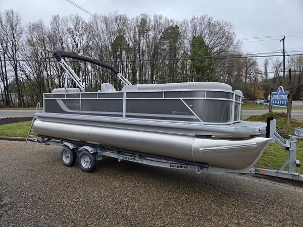 Slide: The Image of 2024 Godfrey Xperience 2286 SBX pontoon boat on a trailer. - 0