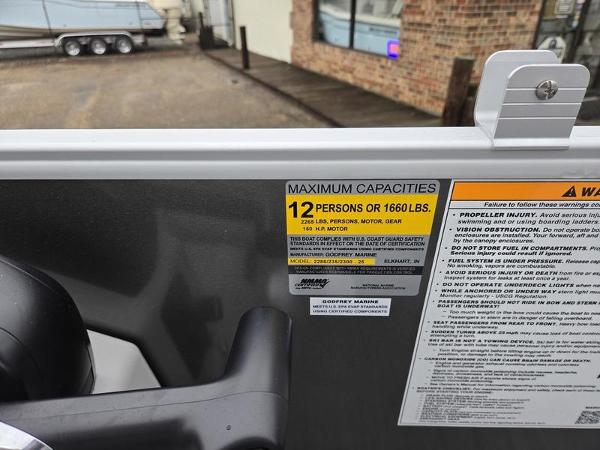 Slide: The Image of 2024 Godfrey Xperience 2286 SBX boat capacity label, 12 persons or 1660 lbs. - 11