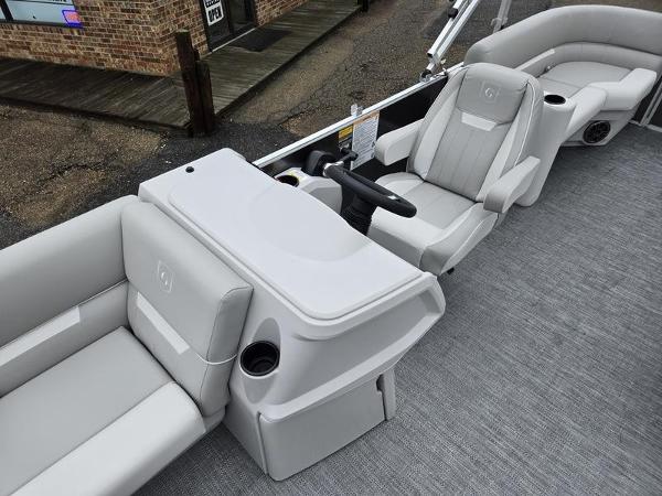 Slide: The Image of 2024 Godfrey Xperience 2286 SBX pontoon boat interior with helm and seating. - 13