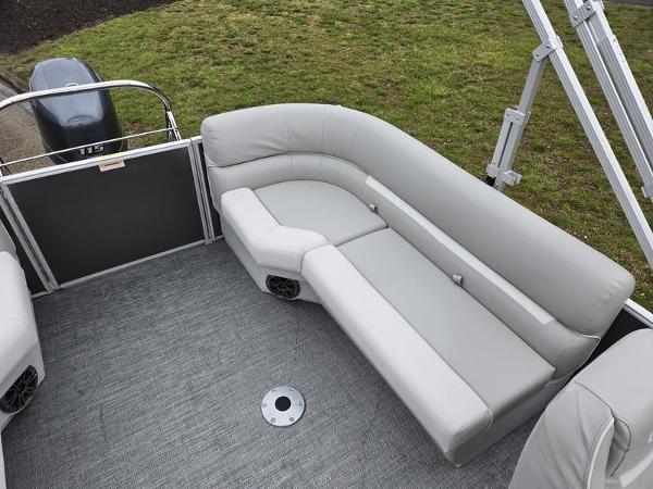 Slide: The Image of 2024 Godfrey Xperience 2286 SBX pontoon boat with gray seating and carpeted deck. - 5