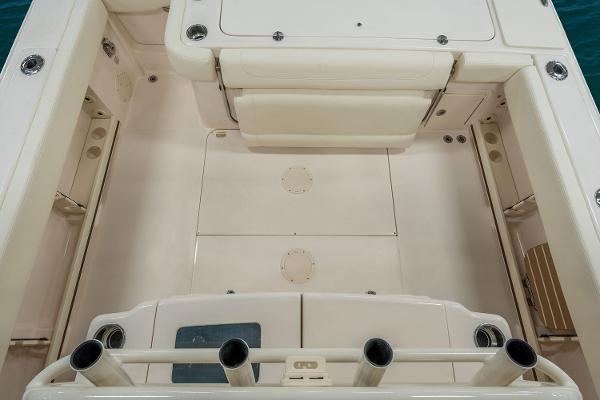 Slide: The Image of Manufacturer Provided Image: 2019 Grady-White Canyon 306 boat deck with rod holders and seating. - 13