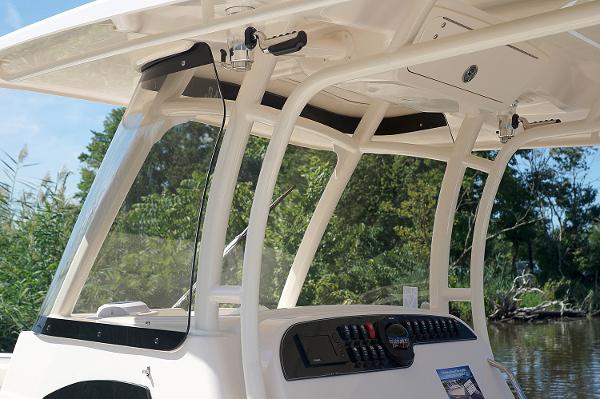 Slide: The Image of Manufacturer Provided Image: 2019 Grady-White Canyon 306 boat console and windshield, close-up view. - 9