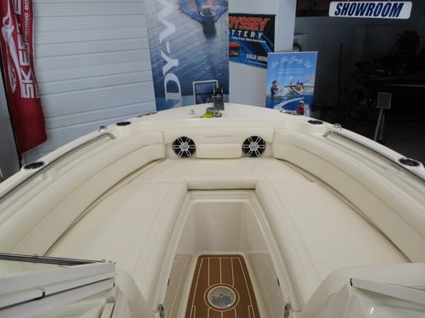 Slide: The Image of 2023 Grady-White Freedom 235 boat interior in showroom. - 3