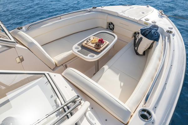 Slide: The Image of Manufacturer Provided Image: 2023 Grady-White Freedom 275 boat with spacious seating and table on the deck. - 6