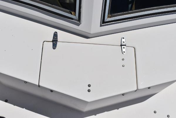 Slide: The Image of 1987 Grady-White Offshore 24 boat deck with hatch and window. - 43
