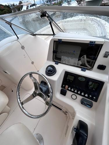 Slide: The Image of 2009 Grady-White Tournament 225 boat helm with Garmin navigation system. - 6