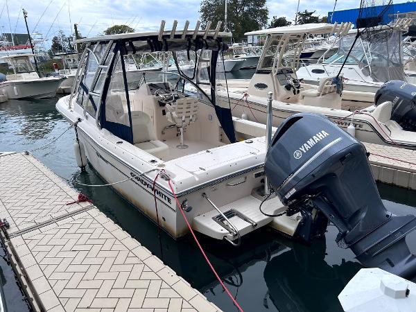 Slide: The Image of 2009 Grady-White Tournament 225 boat docked with Yamaha outboard motor. - 7