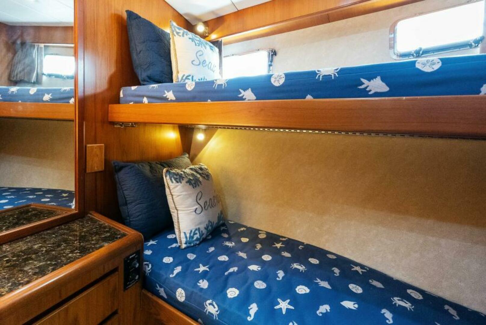 Slide: The Image of 2001 Grand Alaskan 64 Pilot House Bunk Stateroom  - 5433944