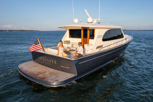 Slide: The Image of Luxury Eastbay EB60 yacht cruising on open water, 2023 model. - 15