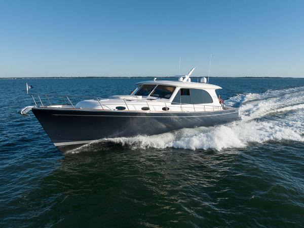Slide: The Image of Eastbay EB60 yacht cruising on open water, 2023 model. - 7