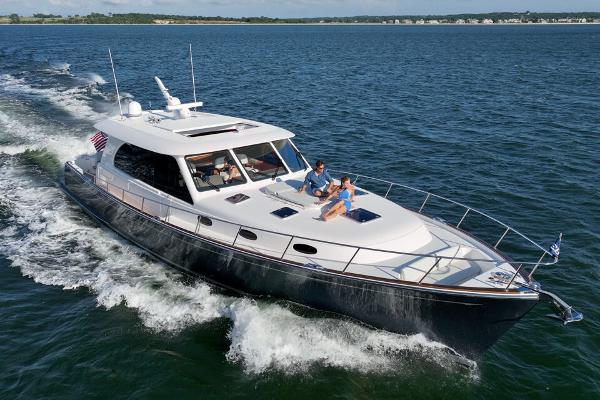 Slide: The Image of Eastbay EB60 yacht cruising on open water, 2023 model. - 9