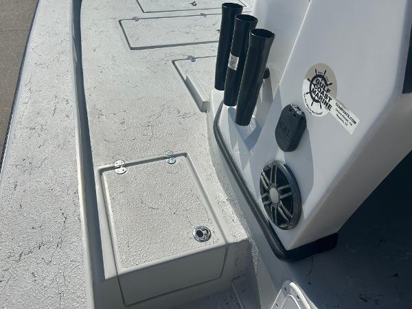 Slide: The Image of 2024 Gulf Coast VariSide boat deck with rod holders and speaker. - 10