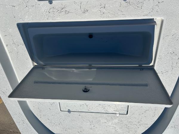 Slide: The Image of 2024 Gulf Coast VariSide storage compartment with open lid. - 14