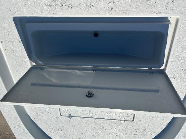 Slide: The Image of 2024 Gulf Coast VariSide storage compartment with open lid. - 15