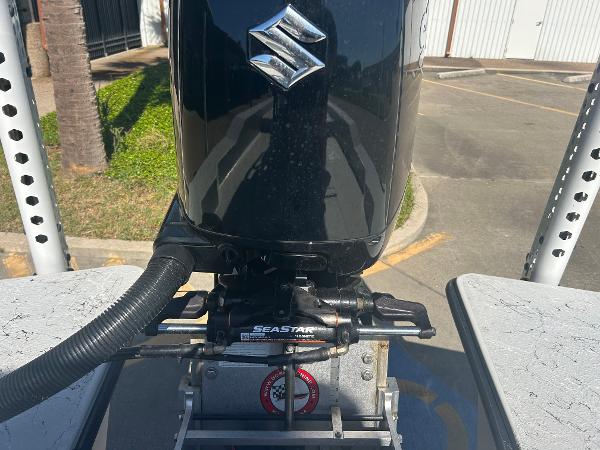 Slide: The Image of 2024 Gulf Coast VariSide boat with Suzuki outboard motor and SeaStar hydraulic steering. - 23