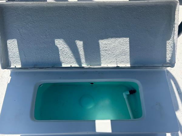 Slide: The Image of Open livewell compartment of 2024 Gulf Coast VariSide boat. - 4