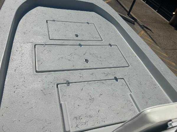 Slide: The Image of 2024 Gulf Coast VariSide boat deck with storage compartments. - 7