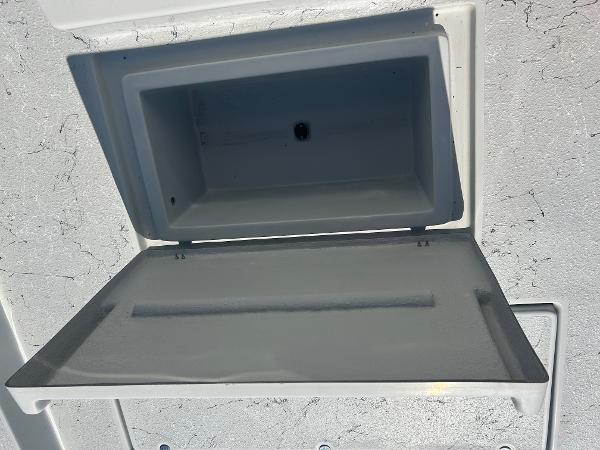Slide: The Image of 2024 Gulf Coast VariSide storage compartment with open lid. - 8