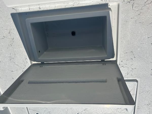 Slide: The Image of Open storage compartment on a 2024 Gulf Coast VariSide boat. - 9
