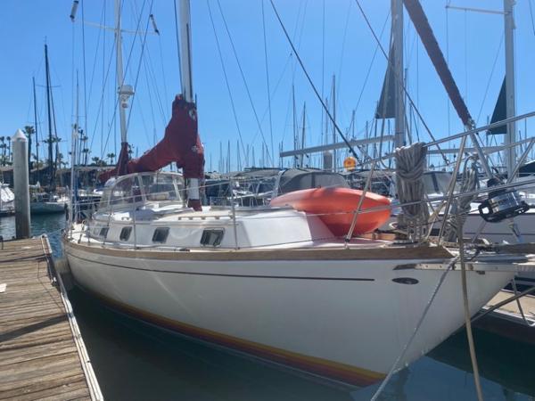 Slide: The Image of 1978 Gulfstar 50 sailboat docked at marina. - 1