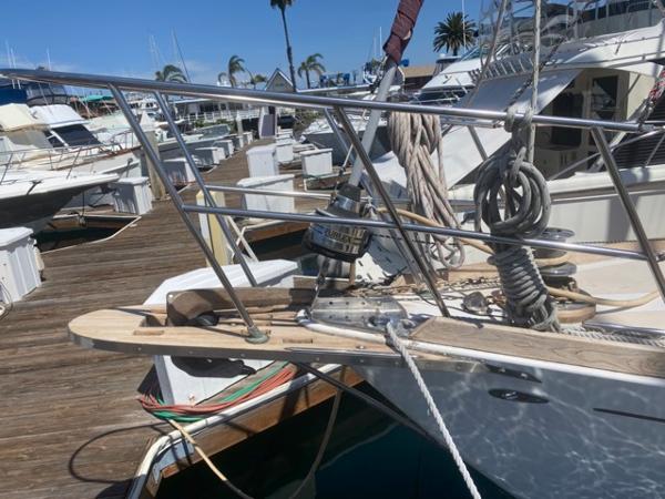 Slide: The Image of 1978 Gulfstar 50 sailboat docked at a marina with other boats. - 10