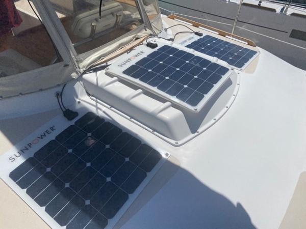 Slide: The Image of Solar panels on a 1978 Gulfstar 50 yacht deck for renewable energy. - 3