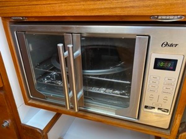 Slide: The Image of Built-in Oster microwave in 1978 Gulfstar 50 yacht kitchen. - 32