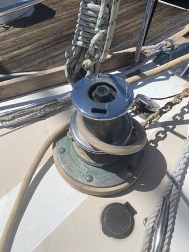 Slide: The Image of 1978 Gulfstar 50 sailboat deck with winch and ropes. - 4