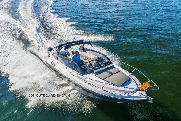 Slide: The Image of 2025 Hanover 305 boat cruising on open water, showcasing sleek design and performance. - 0