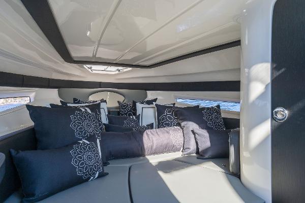 Slide: The Image of Luxurious interior of 2025 Hanover 305 boat with elegant cushions and modern design. - 10