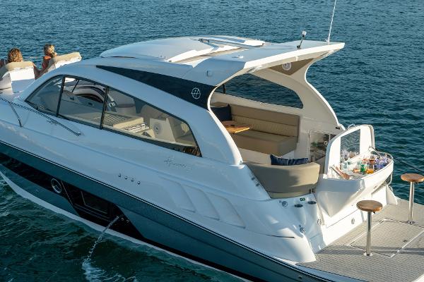 Slide: The Image of Luxury Hanover 375 yacht cruising on open water, 2025 model. - 13