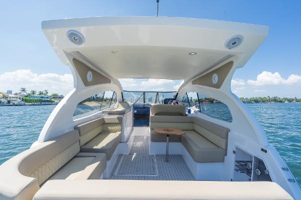 Slide: The Image of Luxurious 2025 Hanover 375 yacht interior with spacious seating and scenic ocean view. - 17