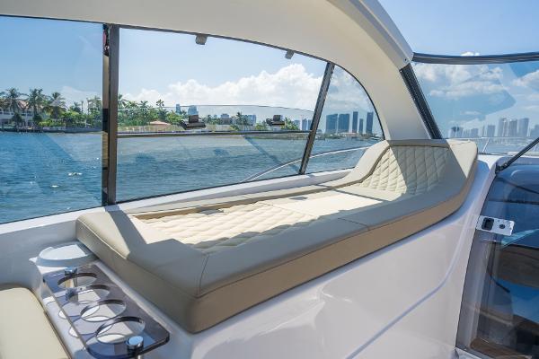 Slide: The Image of Luxurious interior of 2025 Hanover 375 yacht with waterfront view. - 21