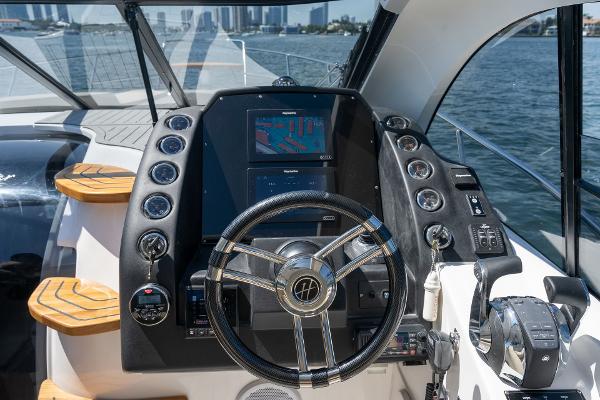 Slide: The Image of Cockpit of 2025 Hanover 375 yacht with modern steering and navigation system. - 22