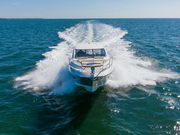 Slide: The Image of 2025 Hanover 375 yacht cruising swiftly on open sea. - 7