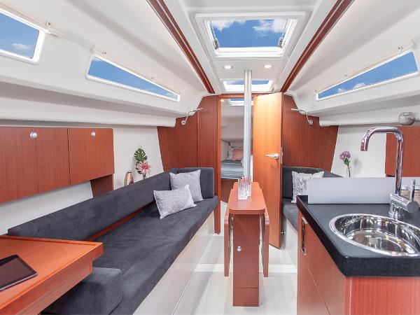 Slide: The Image of Interior of 2024 Hanse 315 sailboat with modern design and skylights. - 10