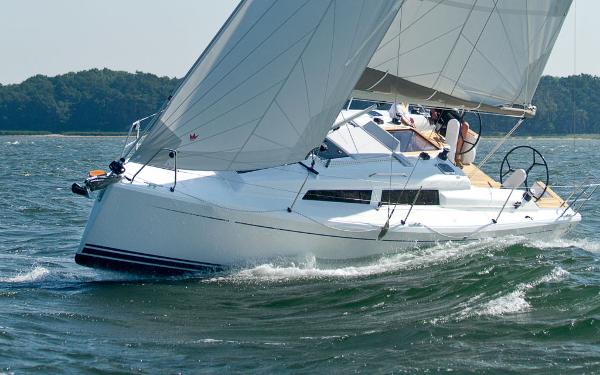 Slide: The Image of 2024 Hanse 315 sailboat navigating through water. - 3